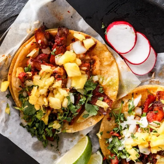 You didn't know these 9 surprising facts about tacos al pastor