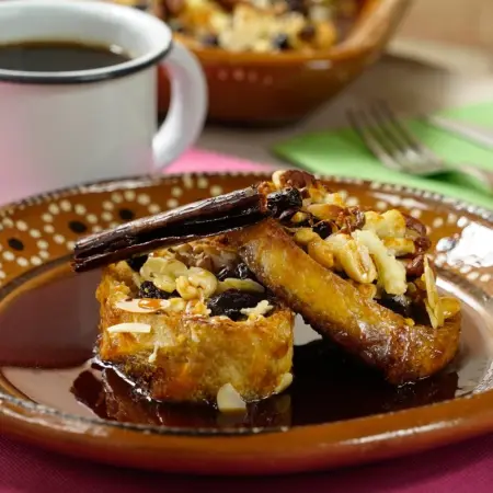 Why is capirotada eaten during Lent?