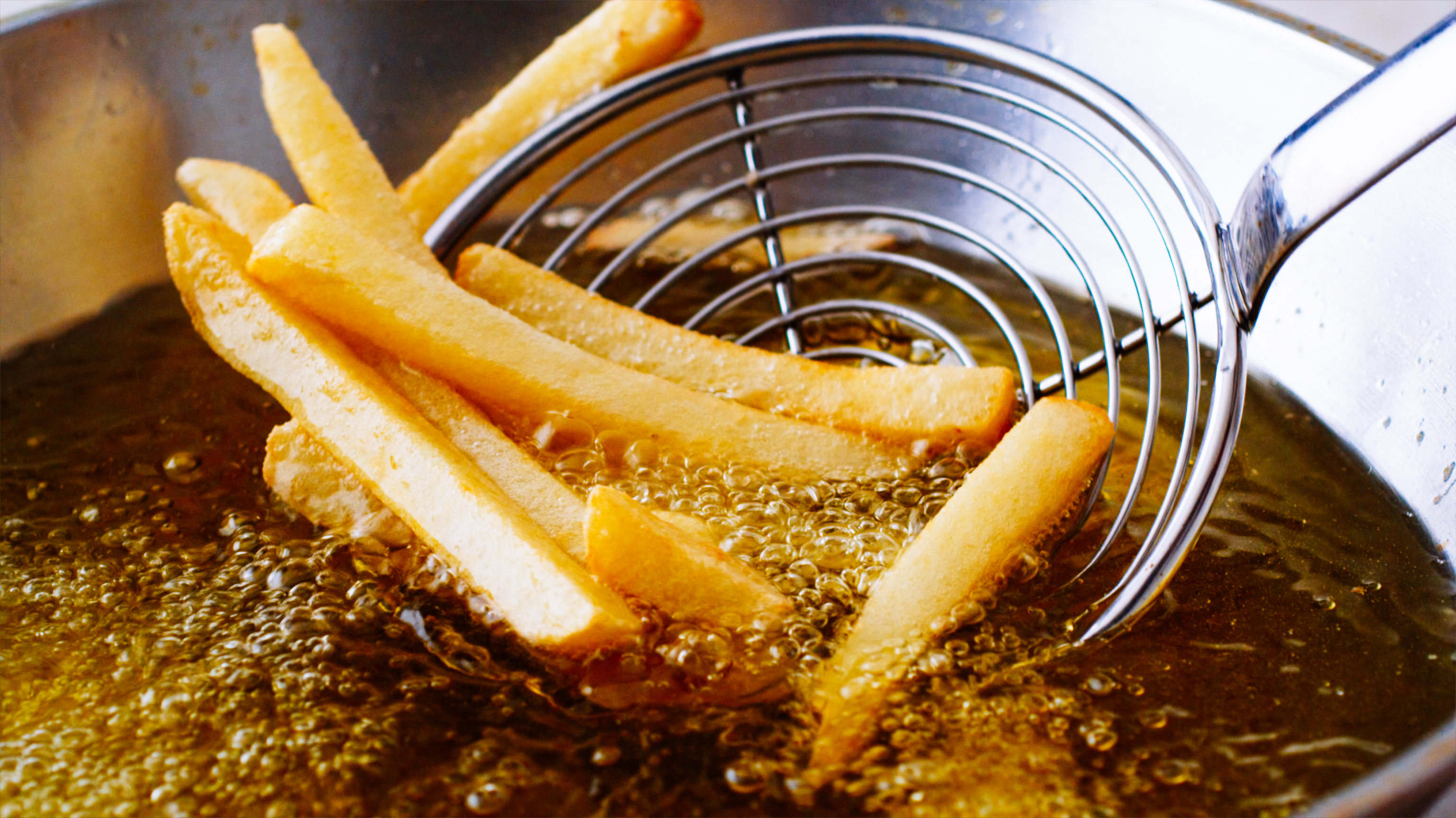 French fries in the fryer