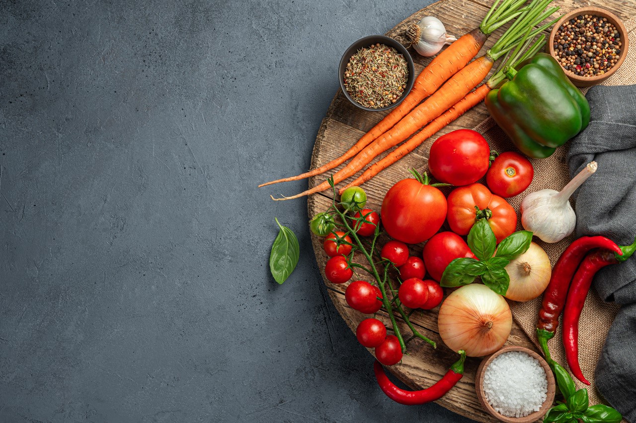 tomatoes, peppers, and spices in the kitchen
