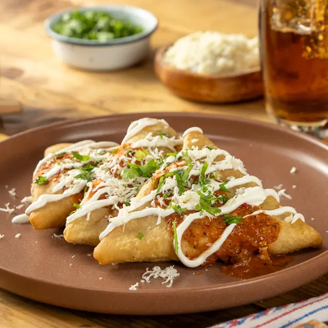 Fried potato tetelas with chorizo