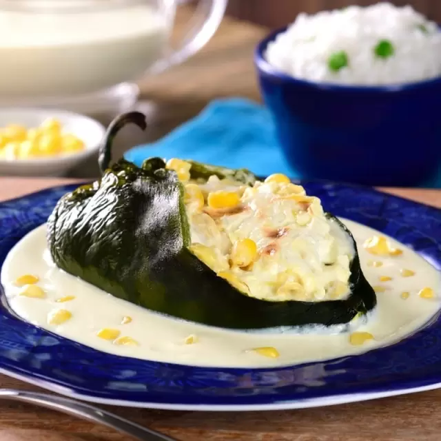 Chicken Stuffed Chiles with Corn Sauce