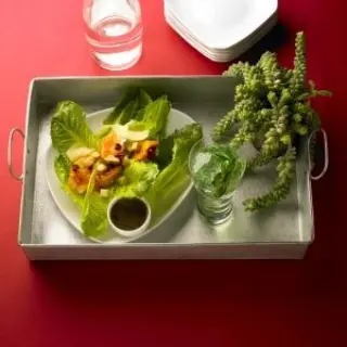Caesar salad with marinated chicken