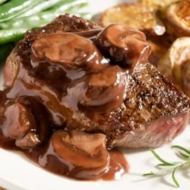 Beef steak in mushroom sauce