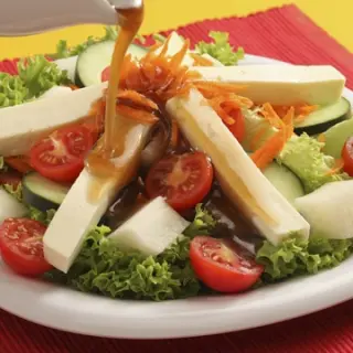 Salad with sweet and sour dressing