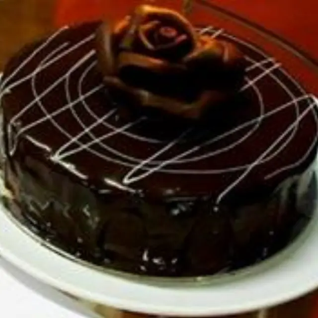Chocolate cake with walnuts and almonds