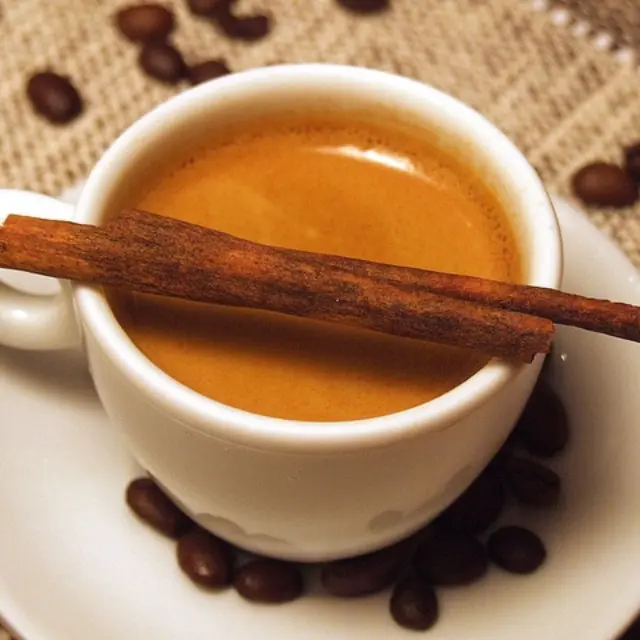Coffee with 2 Cinnamon Sticks