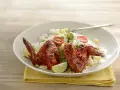Wings with Achiote and Red Chili over Rice with Vegetables