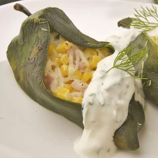Chilli stuffed with corn, ham and cheese.
