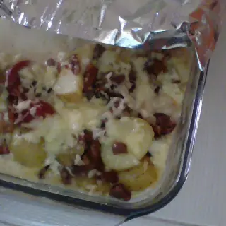 Baked Potatoes With Ham And Bacon