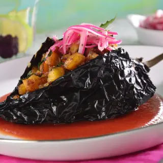 Stuffed Ancho Chile with Plantain in Tomato Sauce