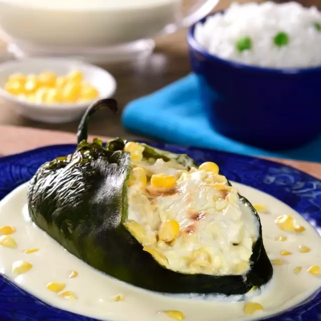 Chicken Stuffed Chiles with Corn Sauce