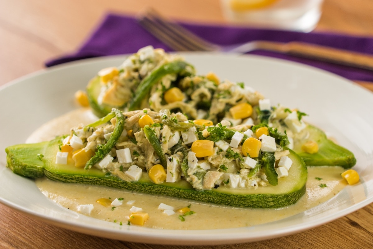 Calabacitas Stuffed with Rajas with Panela Cheese in Salsa de Elote