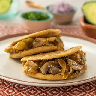 Stuffed Gorditas with Mushrooms in Green Sauce