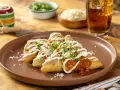 Fried potato tetelas with chorizo